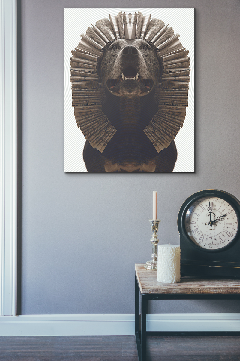 Pet art hanging in an office setting. Dog portrait features a rescued pit bull dog wearing a headress made from upcycled materials inspired by the Sphinx in Egypt.