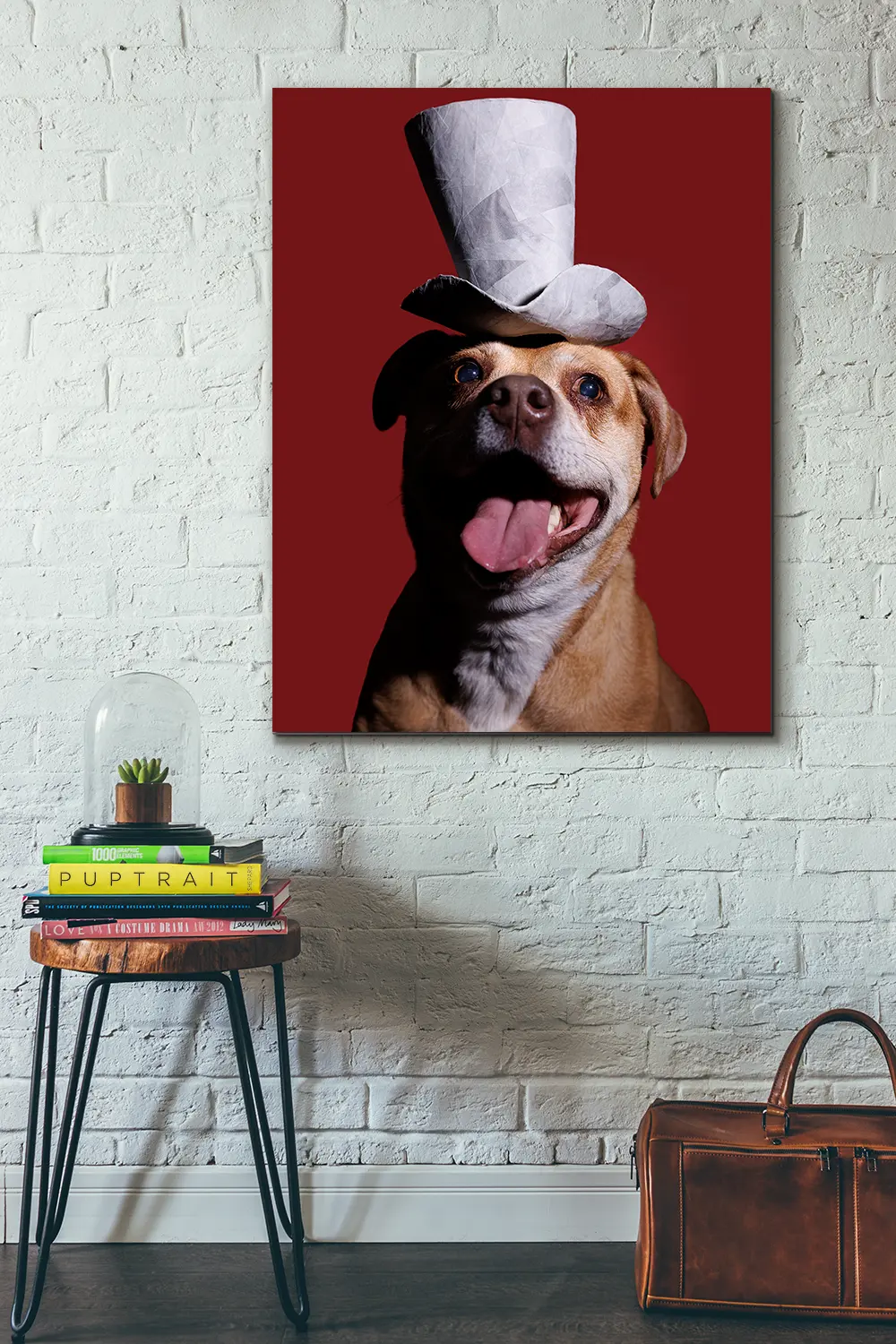 Large print portrait of a smiling dog against a red background wearing a white top hat